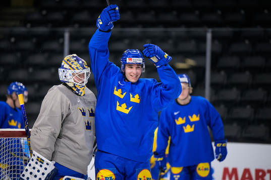 Goaltender Calle Clang and Daniel Torgersson of the Swedish
