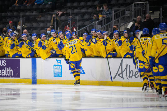 Oskar Olausson of Sweden celebrates with teammates