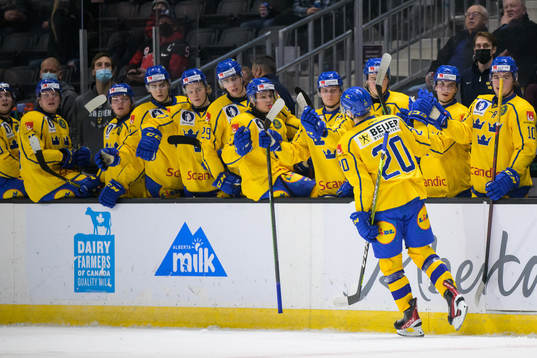 Albert Sjöberg of Sweden celebrates with teammates