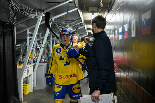 Victor Sjöholm and assistant coach Joel Rönnmark of