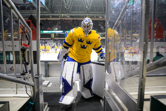 Goaltender Jesper Wallstedt of Sweden leaves warm-up