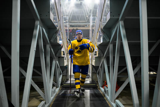 Anton Olsson of Sweden leaves warm-up