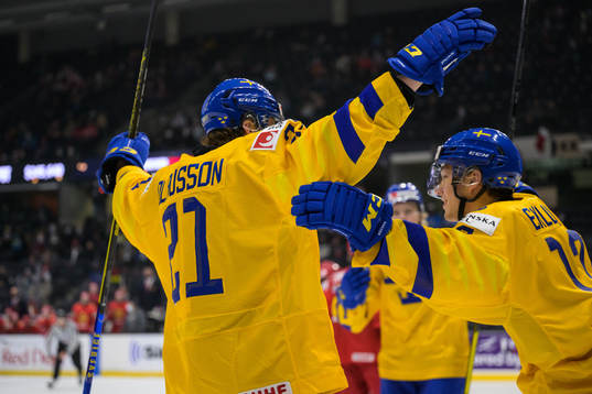 Oskar Olausson and William Eklund of Sweden celebrate the