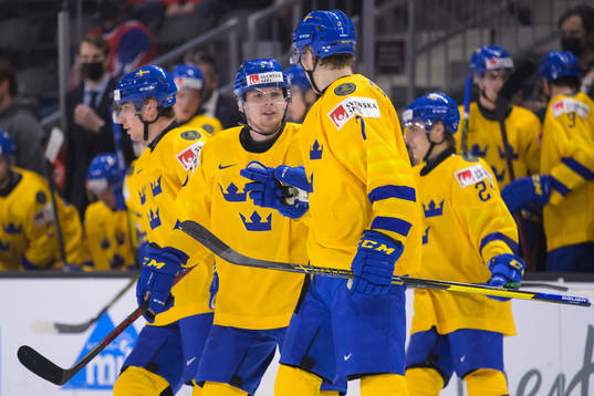 Anton Olsson and Simon Edvinsson of Sweden celebrate