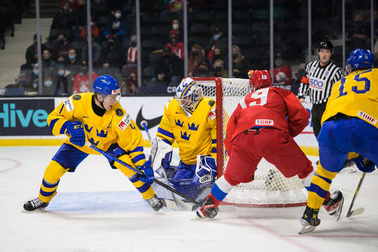 Emil Andrae, goaltender Jesper Wallstedt and Åke