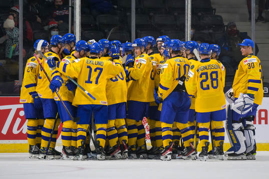 Players of Sweden celebrate their win
