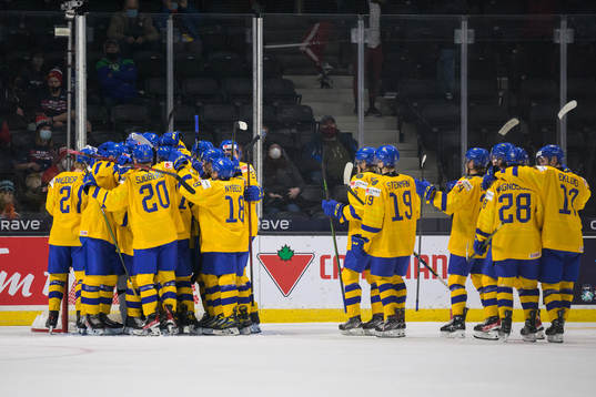 Players of Sweden celebrate their win
