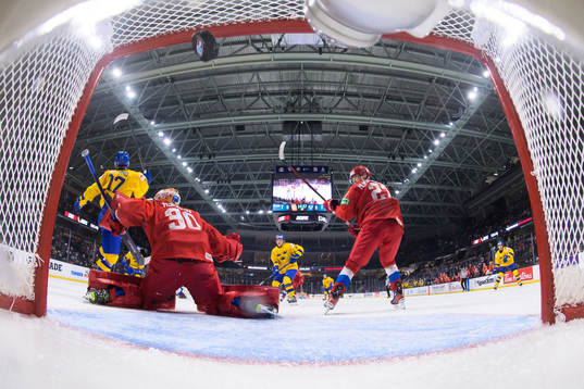 William Eklund of Sweden blocks goaltender Yaroslav Askarov