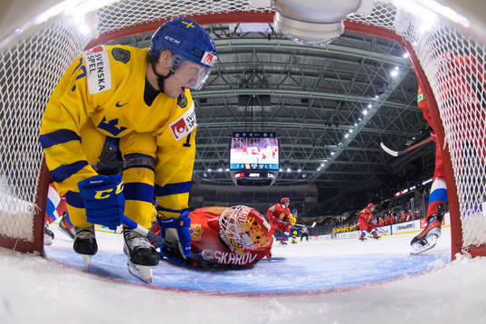 William Eklund of Sweden and goaltender Yaroslav Askarov of