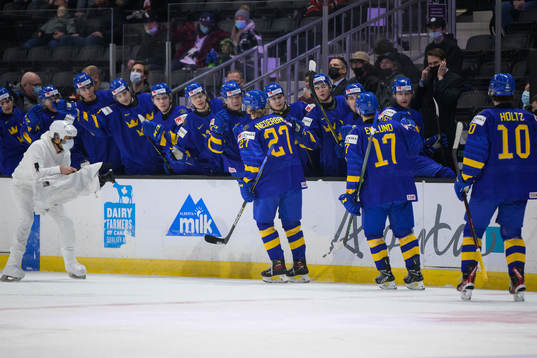 Theodor Niederbach of Sweden celebrates with teammates