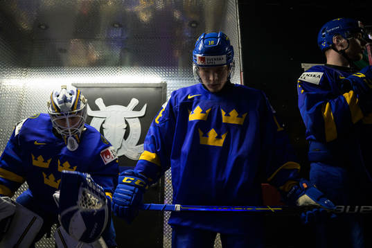Goaltender Jesper Wallstedt, Zion Nybeck and Anton Olsson