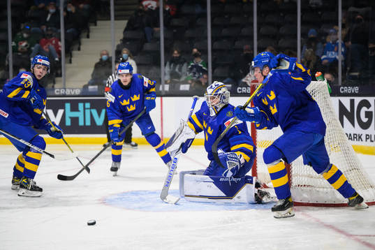 Isak Rosén, goaltender Jesper Wallstedt and Victor