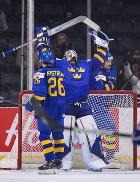 Goaltender Jesper Wallstedt of Sweden celebrates