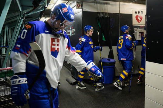 Juraj Slafkovsky of Slovakia looks dejected as Åke