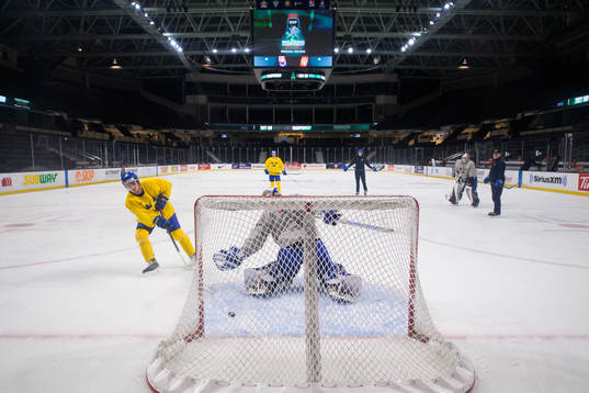 Fabian Lysell and galtender Jesper Wallstedt of Sweden at a