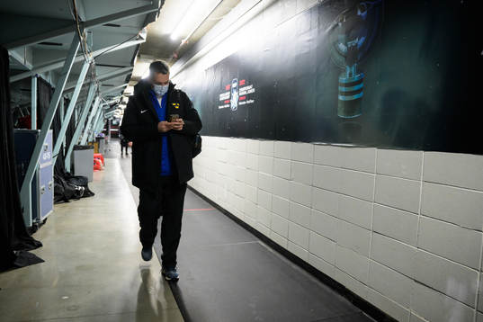 Head coach Tomas Montén of Sweden leaves the arena