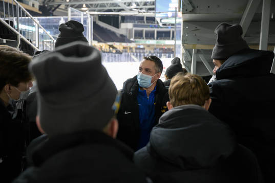 Head coach Tomas Montén of Sweden talks to players