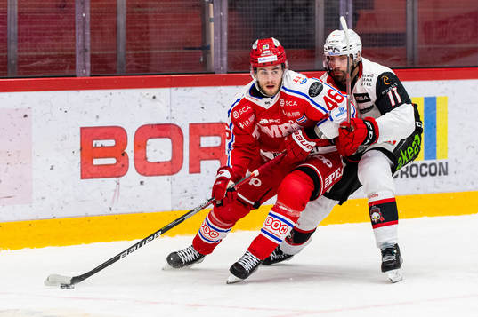Timrås Pontus Åberg och Malmö Redhawks Markus Lauridsen
