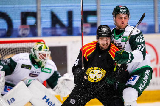 Brynäs Emil Molin och Färjestads Adam Ginning