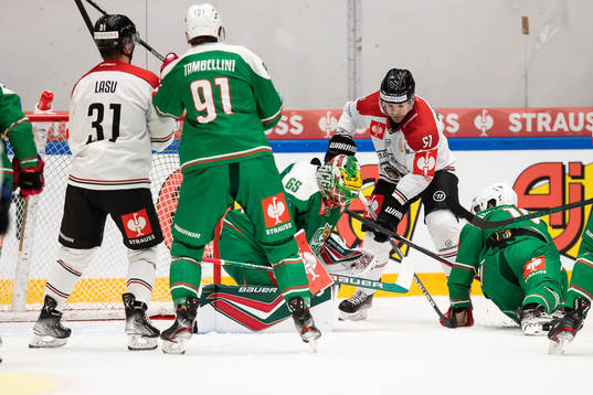 goalkeeper Christoffer Rifalk of Rögle and Mats Rosseli