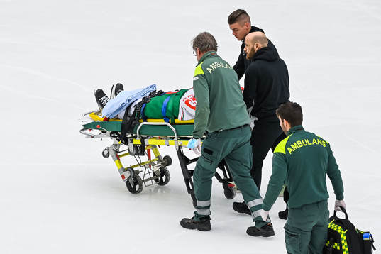 Anton Bengtsson of Rögle is transported off the ice