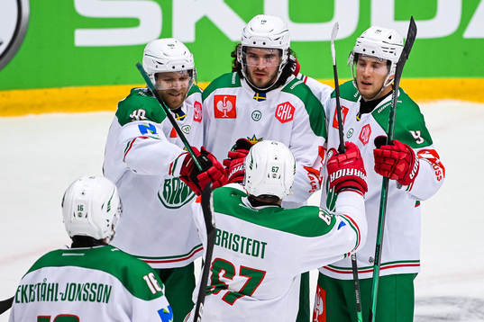 Dennis Everberg of Rögle (M) celebrates with team mates