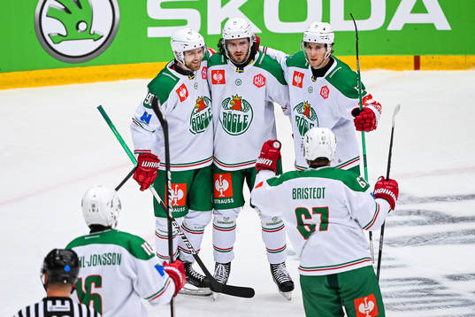 Dennis Everberg of Rögle (M) celebrates with team mates