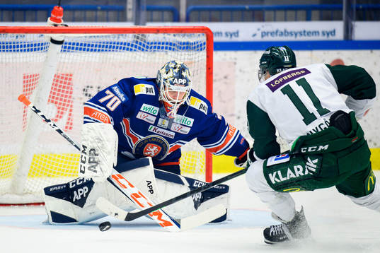 Växjös målvakt Adam Åhman och Färjestads Joakim Nygård