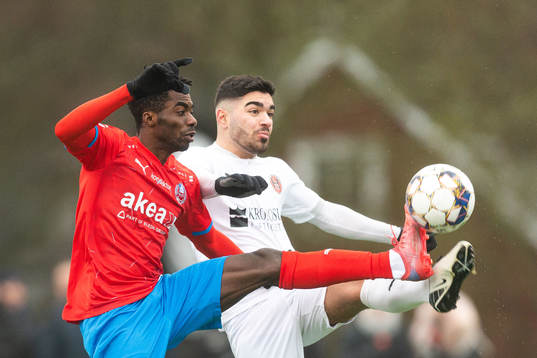 Helsingborgs Benjamin Acquah och Hittarps Johan Ozmanov