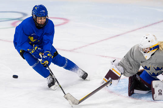 Josefin Bouveng and goaltender Emma Söderberg of Sweden