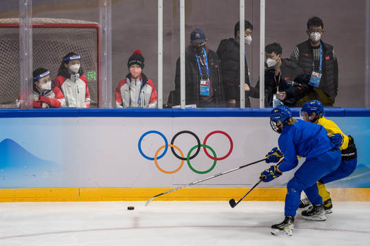 Personel watch Johanna Fällman and Ebba Berglund of Sweden