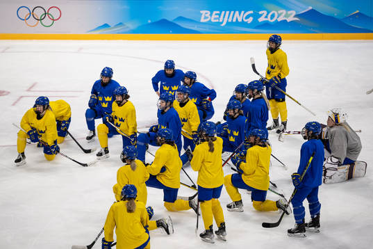 Players of Sweden women's ice hockey team gather