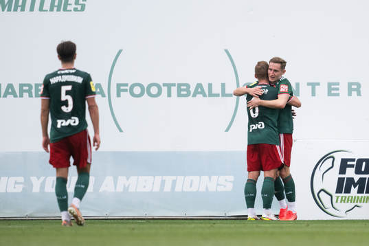 Dmitri Barinov and Jan Kuchta celebrate