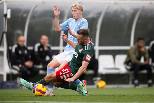 Maciej Rybus of Lokomotiv Moskva and Emil Lindman of Malmö