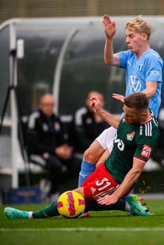 Emil Lindman of Malmö FF and Maciej Rybus of Lokomotiv