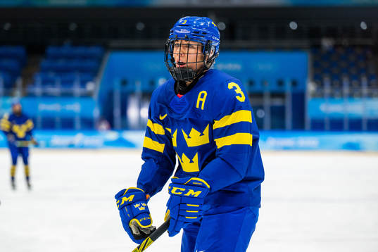 Anna Kjellbin of Sweden reacts in the women’s ice hockey