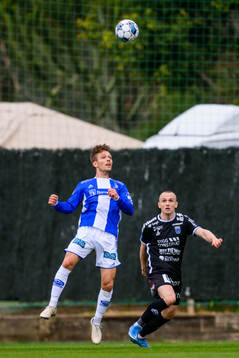 Mikkel Maigaard of Sarpsborg 08 and Aron Bjarnason of Sirius