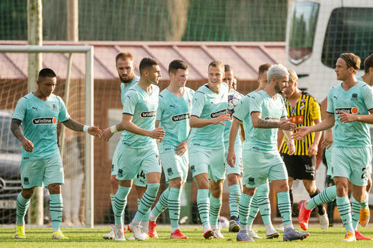 Eduard Spertsyan and Viktor Claesson of Krasnodar celebrate