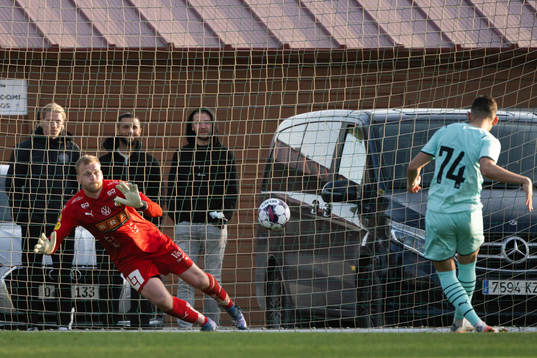 Goalkeeper Peter Abrahamsson of Häcken saves a penalty