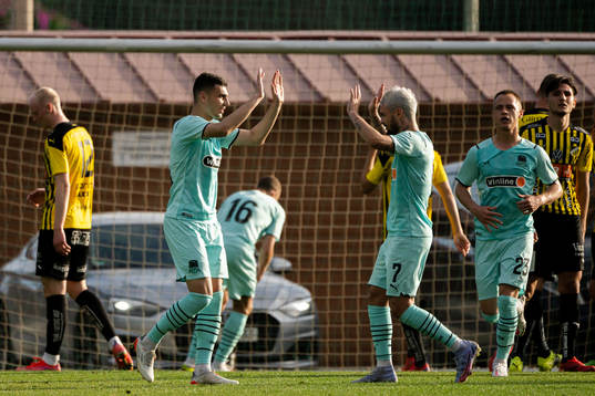 Eduard Spertsyan and Rémy Cabella of Krasnodar  celebrate
