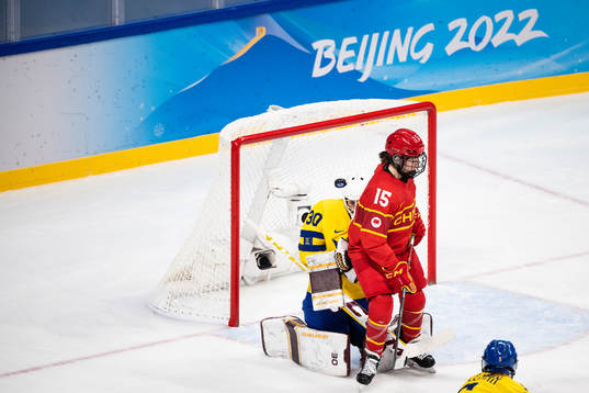 goaltender Emma Söderberg of Sweden and Baozhen Hu of