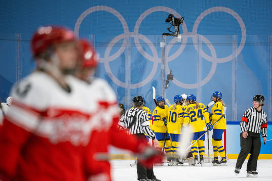 Players of Sweden celebrate