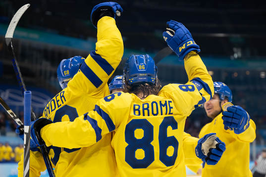 Anton Lander and Mathias Bromé of Sweden celebrate