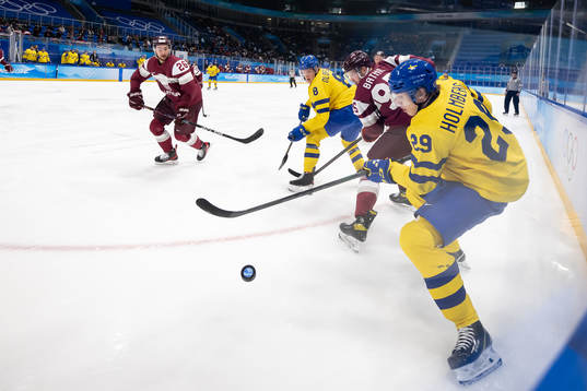 Fredrik Olofsson and Lucas Wallmark against Uvis Balinskis