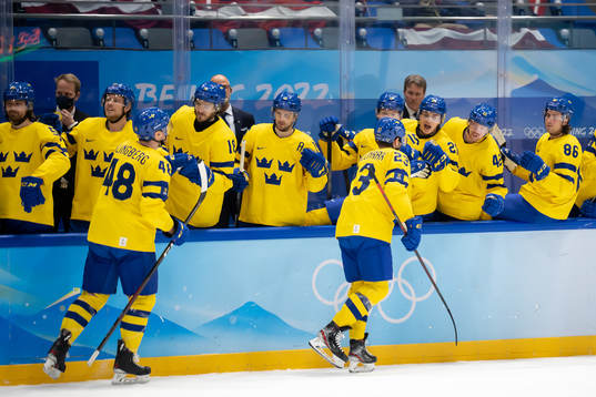 Carl Klingberg and Lucas Wallmark of Sweden celebrate