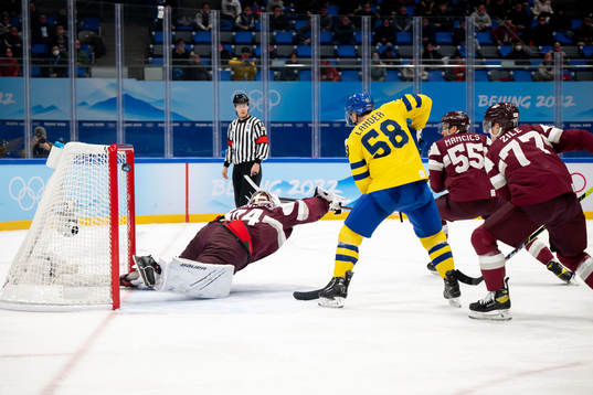 Anton Lander of Sweden in front of goaltender Ivars