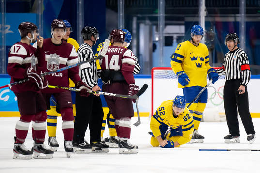 Philip Holm of Sweden in an ice hockey preliminary round