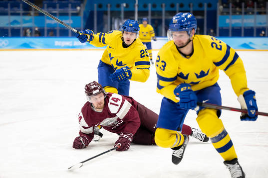 Pontus Holmberg and Lucas Wallmark against Rihards Bukarts