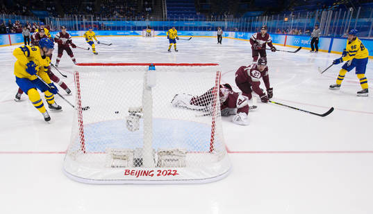 Anton Lander of Sweden scores 2-0 behind goaltender Ivars