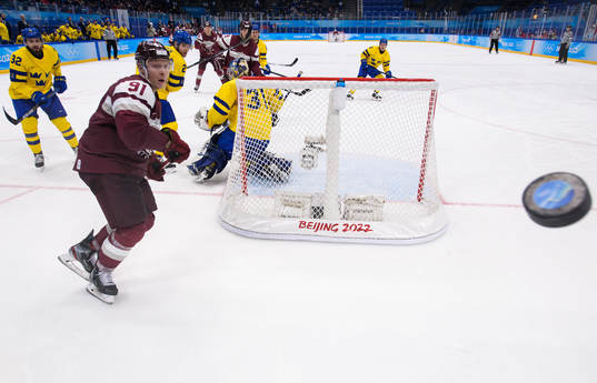 Ronalds Kenins of Latvia in an ice hockey preliminary round